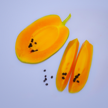 Load image into Gallery viewer, Large edible melon-like orange fruit of tropic conservatory houseplant pawpaw Carica papaya split open showing flesh &amp; seeds 