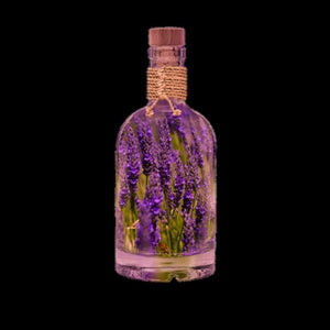 A fragrant glass jar of Lavandula stoechas French Lavender essential oil