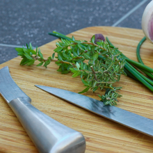 Load image into Gallery viewer, Aromatic organic kitchen herb thyme leaves of Thymus vulgaris chopped ready for cooking | Heartwood Seeds UK