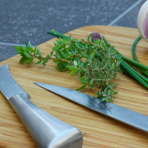 Aromatic organic kitchen herb thyme leaves of Thymus vulgaris chopped ready for cooking | Heartwood Seeds UK